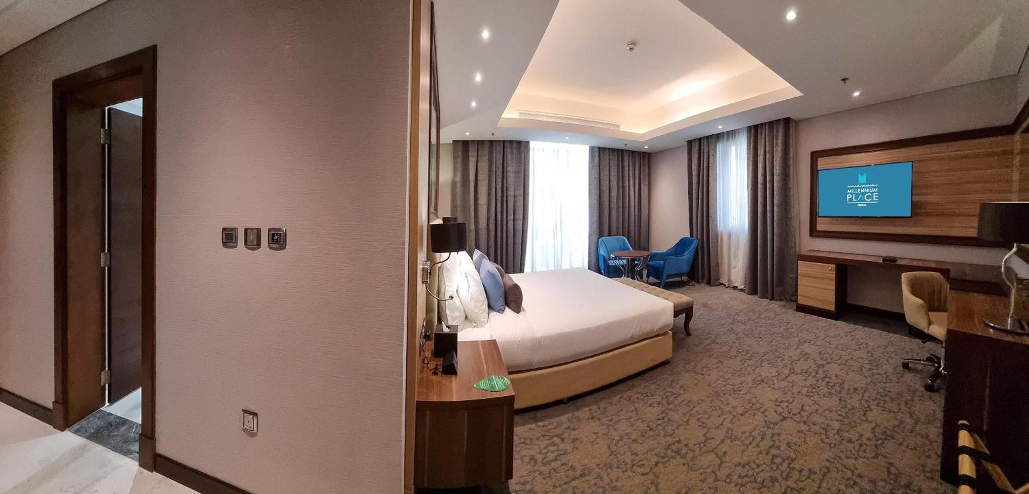 Millennium Place Доха Екстер'єр фото A bedroom at the hotel
