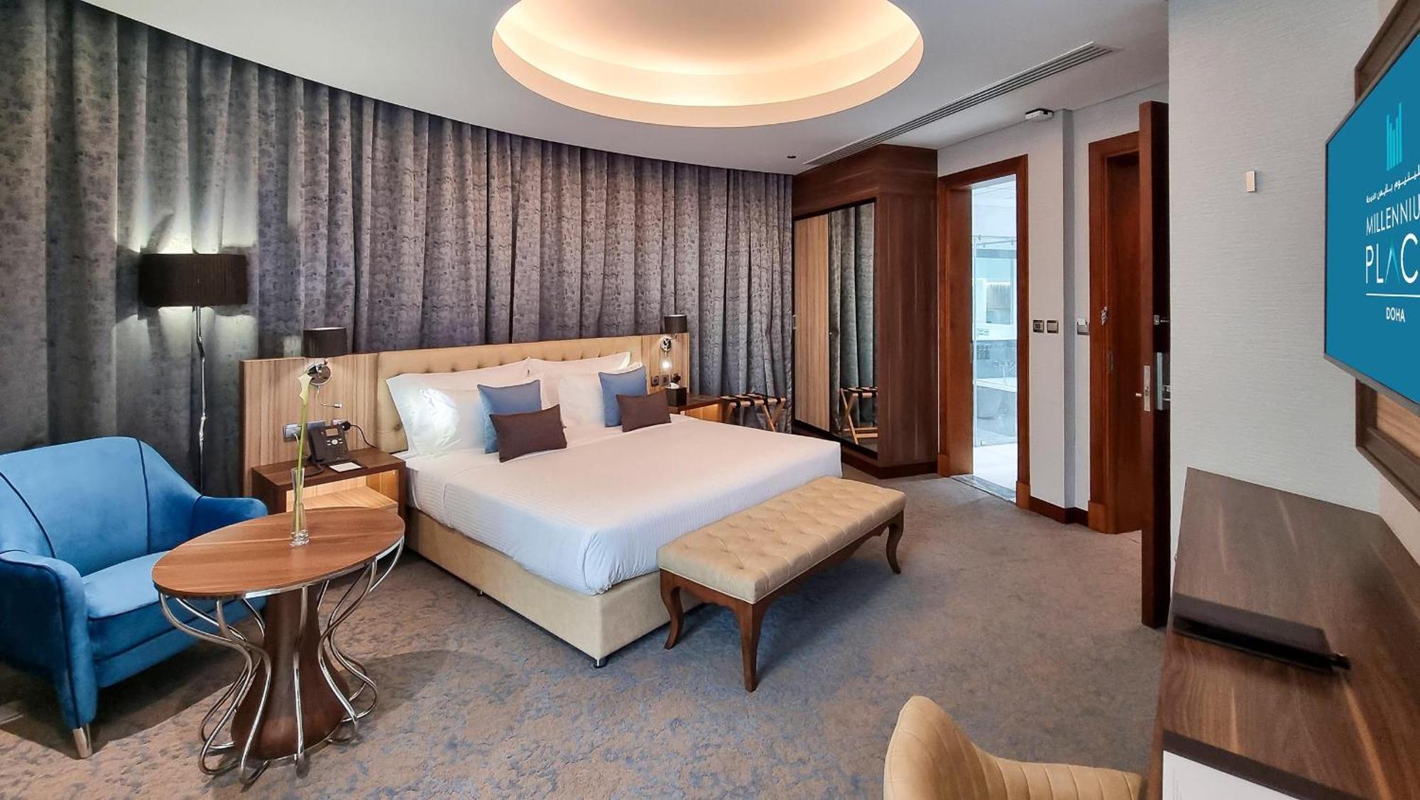 Millennium Place Доха Екстер'єр фото A bedroom at the hotel